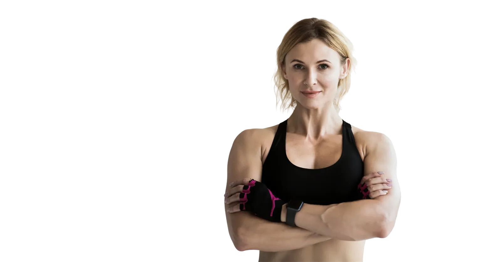 Fit woman in athletic wear with arms crossed, representing HGH therapy