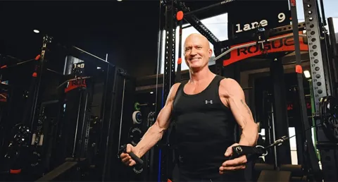 Eric North training on a cable machine